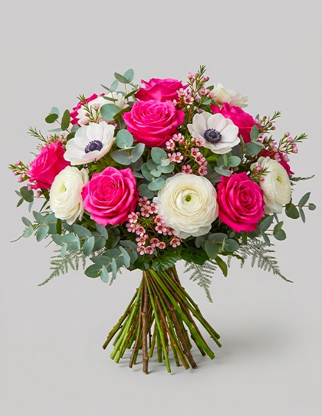 Bouquet Gilberta compatto con rose, ranuncoli e anemoni
