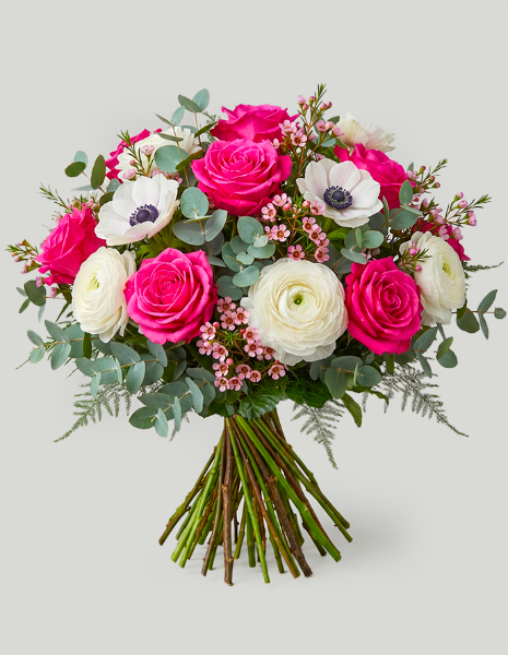 BOUQUET GILBERTA Rose fucsia, ranuncoli rosa, anemoni, wax flower