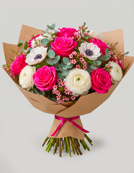 BOUQUET GILBERTA Rose fucsia, ranuncoli rosa, anemoni, wax flower