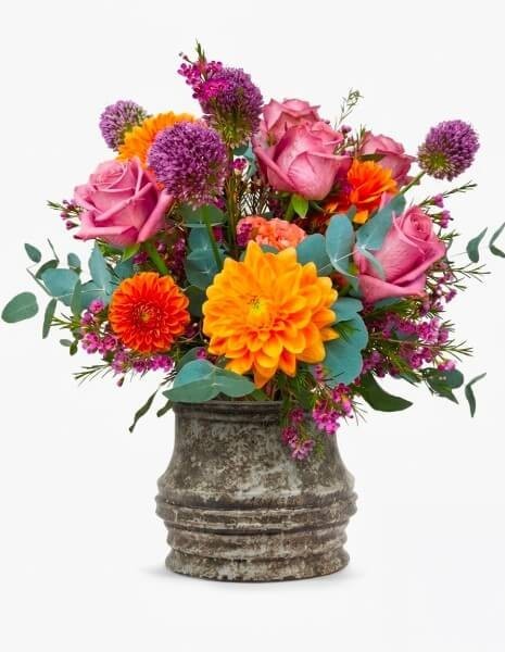 BOUQUET GLENDA Dalia arancio, rose fucsia, fiori di aglio, limonium e wax flower