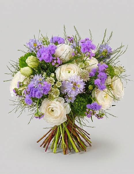 Bouquet Tosca con ranuncoli rosa e fiori lilla